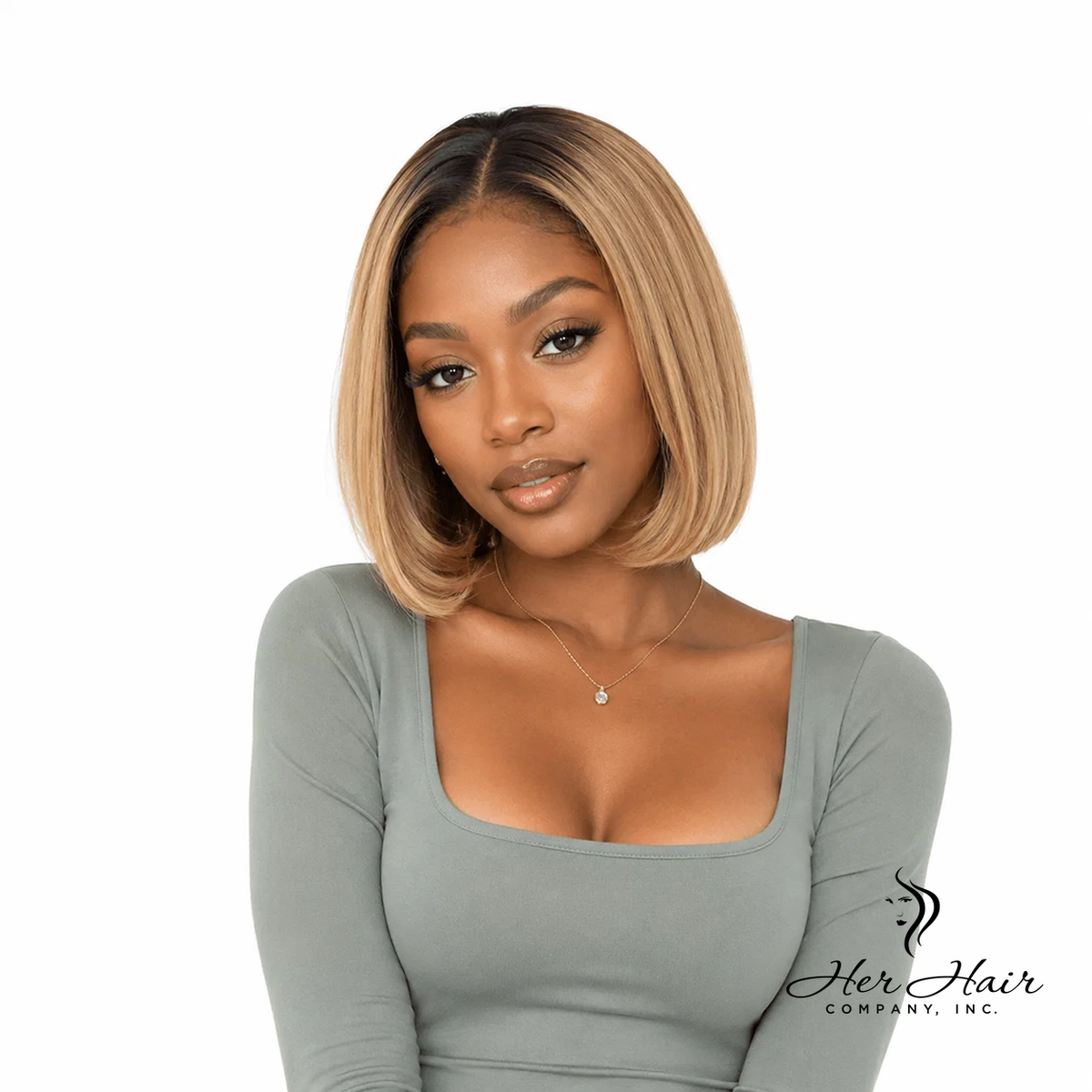 Honey blonde Swiss HD bob wig by Her Hair Company, showcasing smooth, straight hair on a model with a natural hairline.