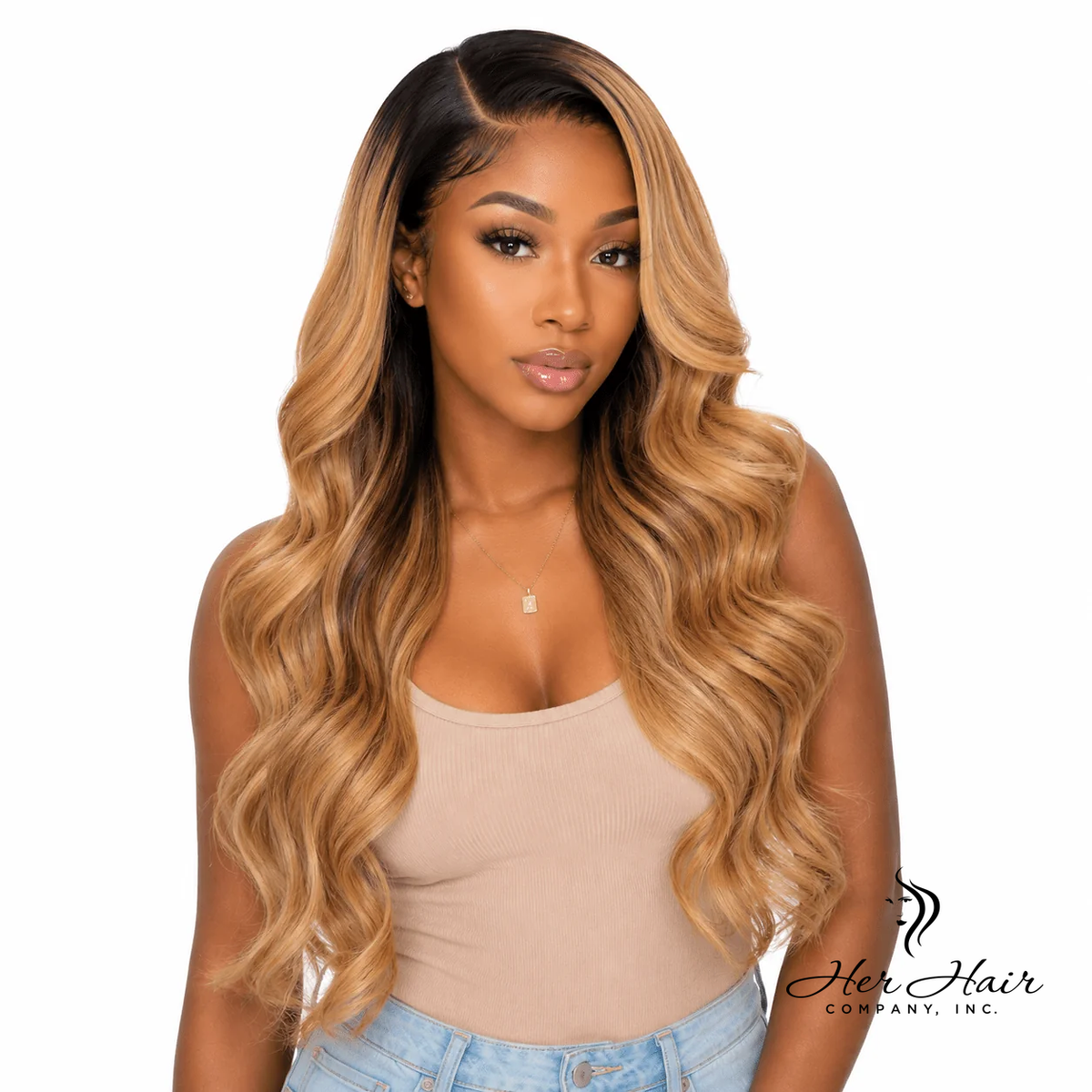 Honey blonde Swiss HD lace wig by Her Hair Company, showcasing natural hairline and silky, layered wig on a model.