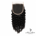 Brazilian kinky curly 4x4 HD lace closure by Her Hair Company, showing the natural textured lace front with curly hair strands.