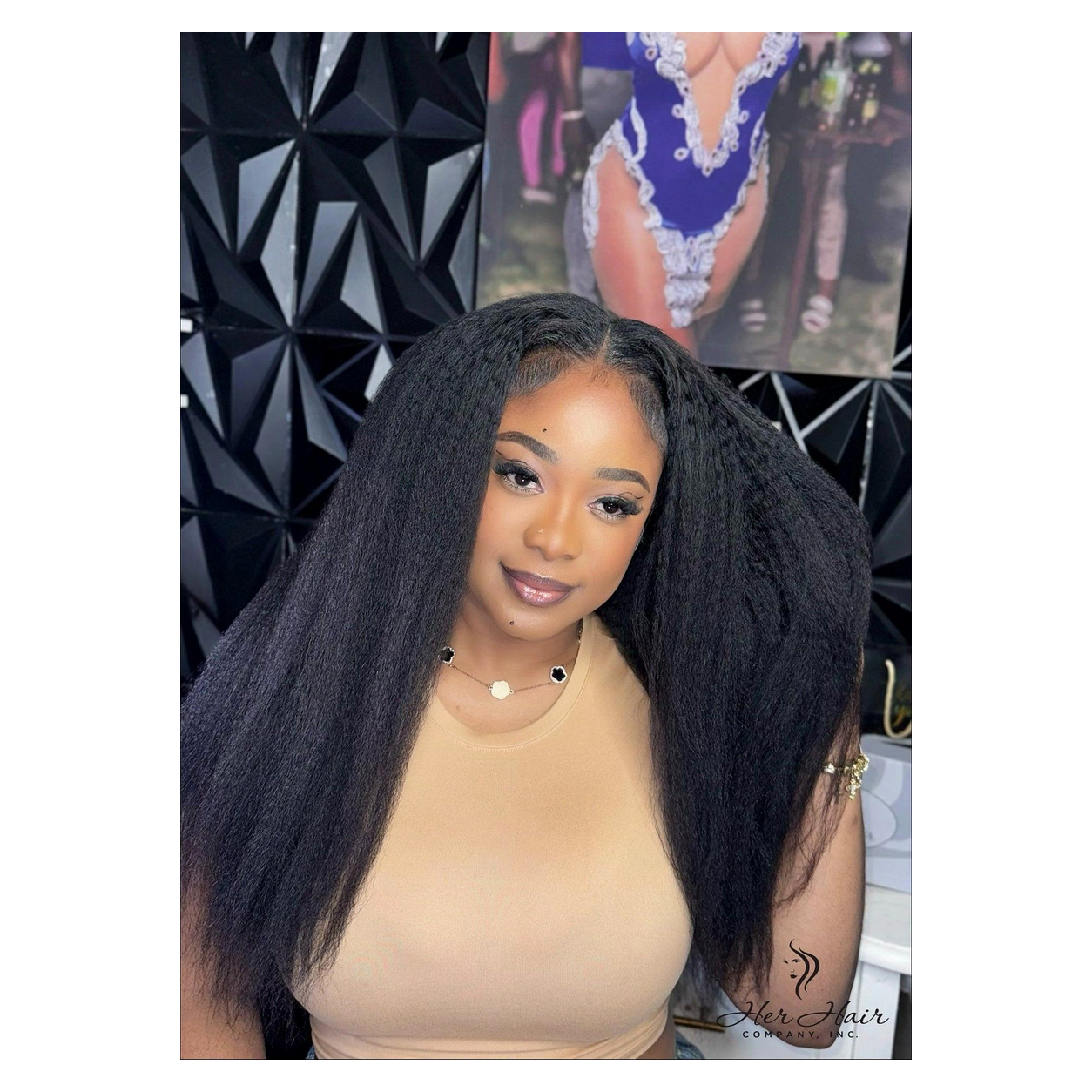 Brazilian kinky straight hair bundles from Her Hair Company, shown installed in a natural-looking hairstyle.