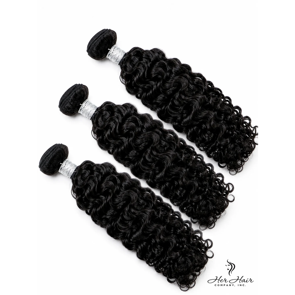 Three bundles of Brazilian Water Wave hair from Her Hair Company, showing the lush, wavy texture and natural shine.