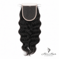 Brazilian wavy 4x4 HD lace closure from Her Hair Company featuring natural wave pattern and transparent lace for seamless blend