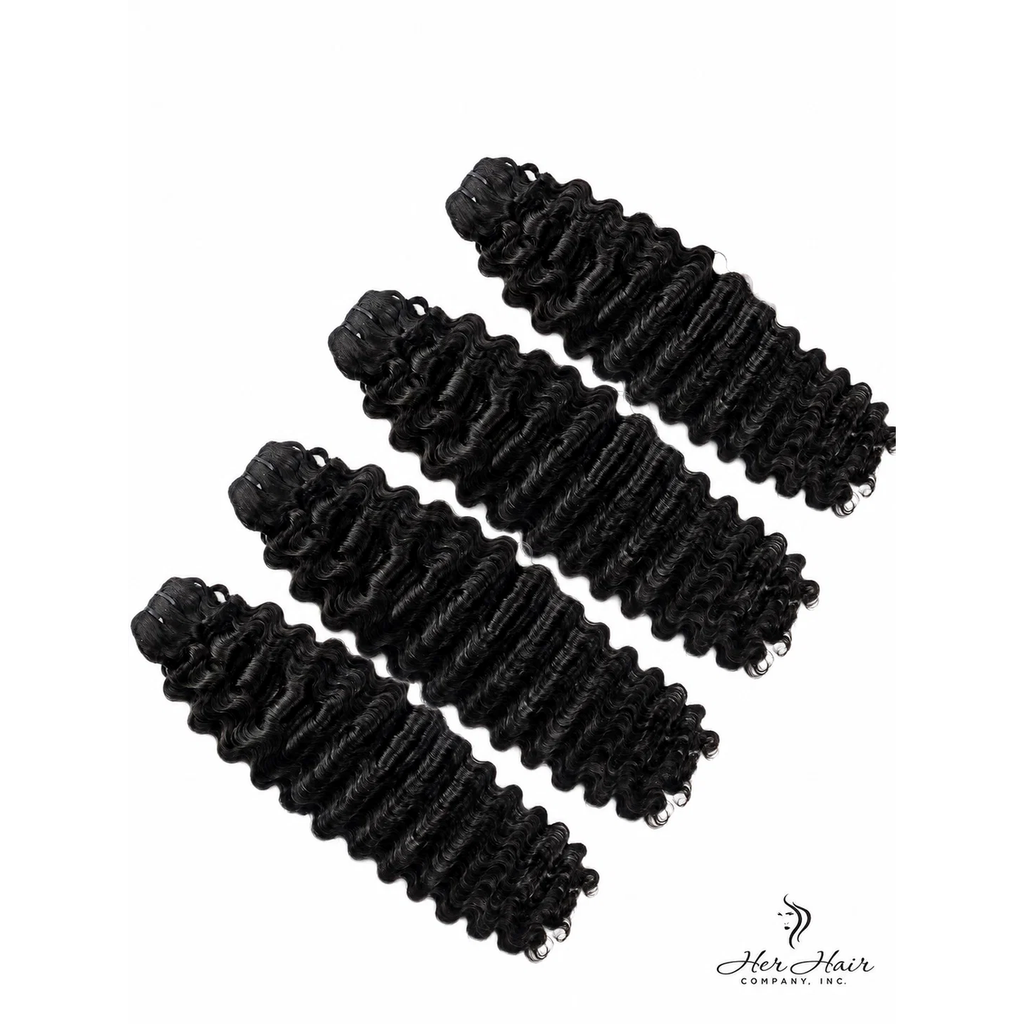 Four bundles of Burmese raw curly hair from Her Hair Company, natural textured hair extensions in a standard bundle set.