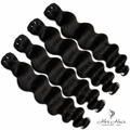 Four bundles of Burmese raw loose deep wave hair from Her Hair Company, showcasing soft, natural textured curly hair bundles.
