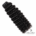 Burmese raw wavy hair bundle from Her Hair Company showing natural wavy texture and full length of the standard hair bundle.