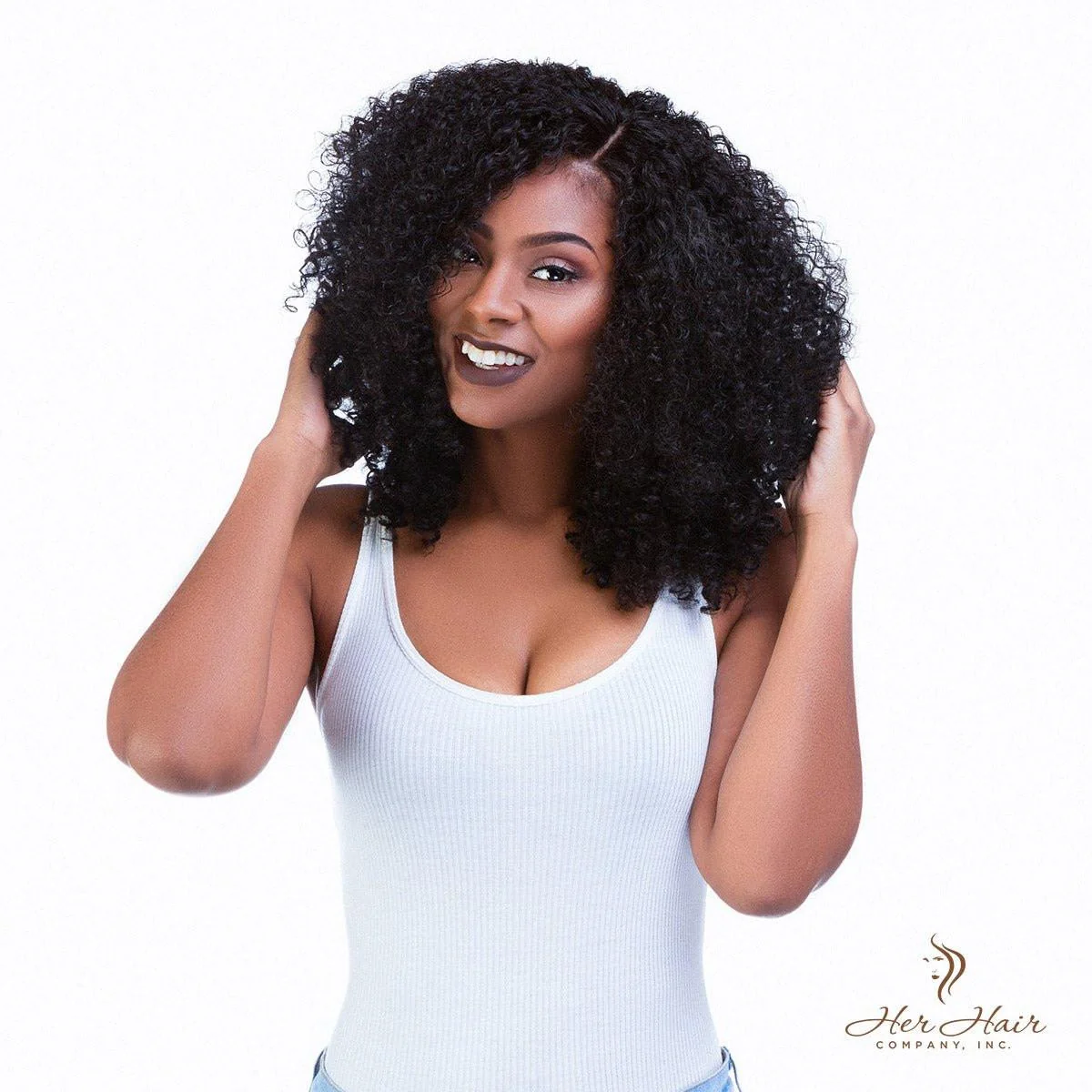 Brazilian kinky curly 4x4 HD lace closure from Her Hair Company, showing the front view with natural curls and lace detailing.