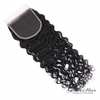 Brazilian raw wavy 5x5 HD lace closure from Her Hair Company, shown from underside with natural hair wave pattern and lace detailing.