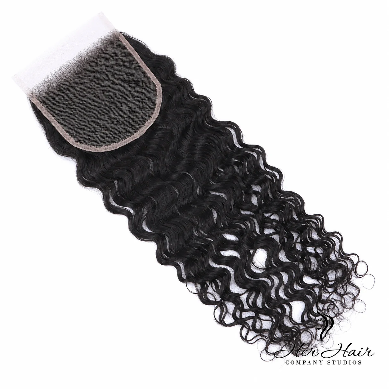 Brazilian raw wavy 5x5 HD lace closure from Her Hair Company, shown from underside with natural hair wave pattern and lace detailing.