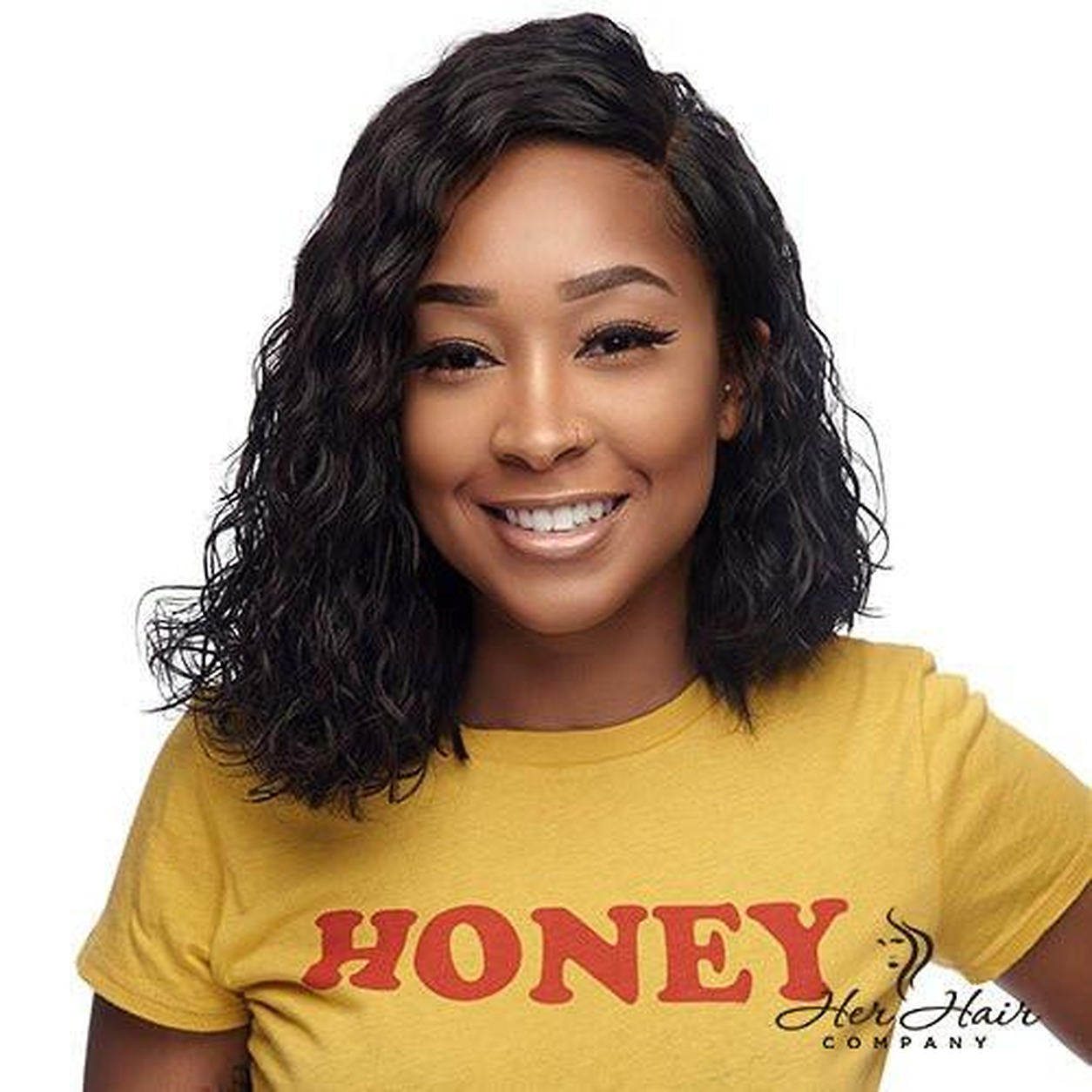 Brazilian wavy hair bundles from Her Hair Company, showing a 4-bundle standard deal styled in a natural wavy look.