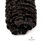 Three bundles of Burmese raw curly hair from vendor-unknown, showcasing natural, textured hair extensions in a standard bundle set.