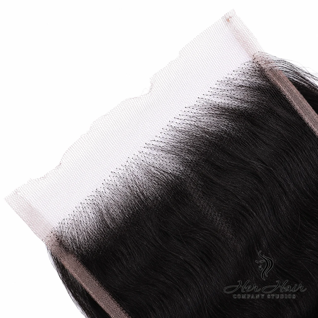 Close-up of Her Hair Company Brazilian Raw Wavy 5x5 HD lace closure showing detailed lace texture and natural wave pattern.