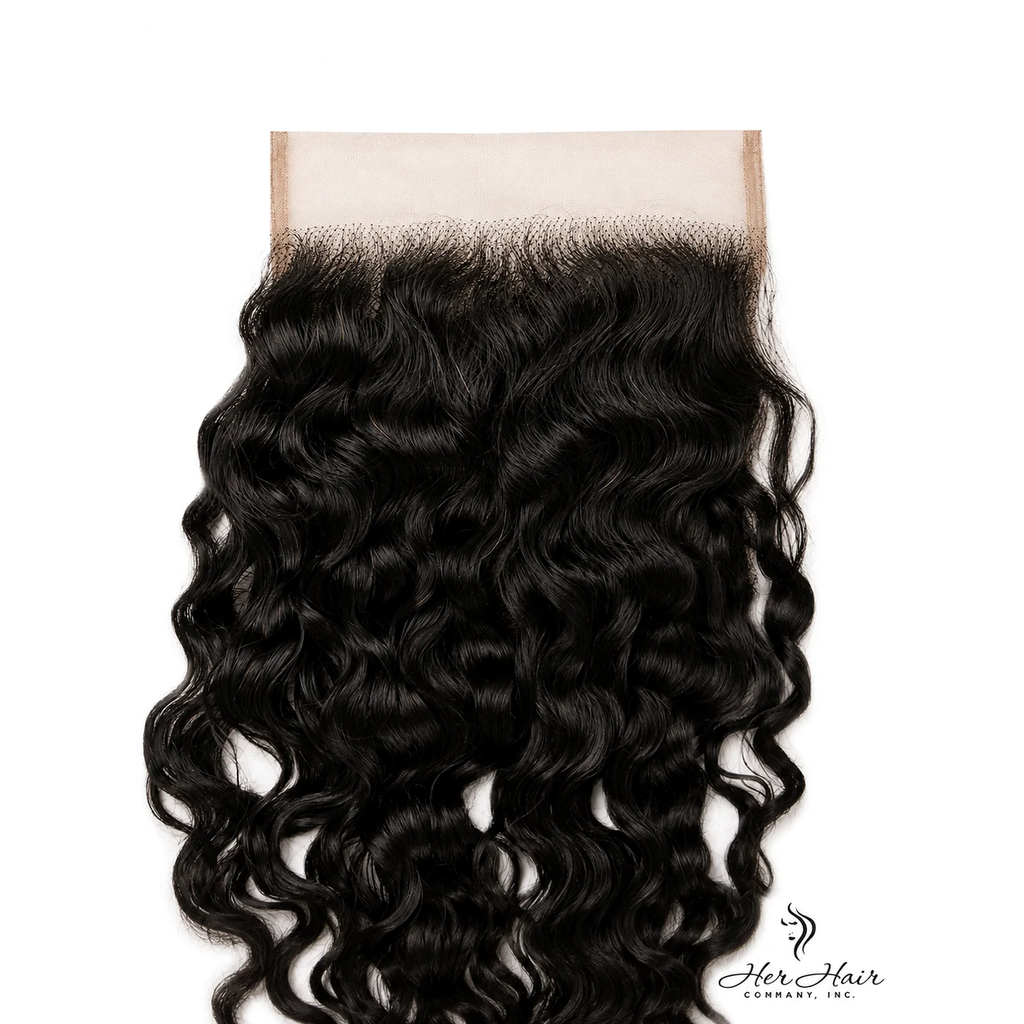 Close-up of Her Hair Company Brazilian Water Wave 5x5 HD lace closure showing detailed hairline and wave pattern.