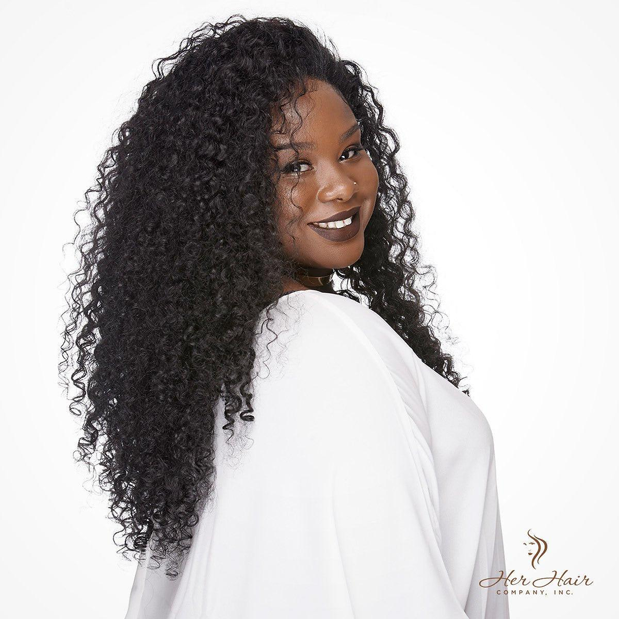 Side view of Burmese Raw Deep Curly Hair bundle from Her Hair Company, showcasing rich, textured deep curly hair.