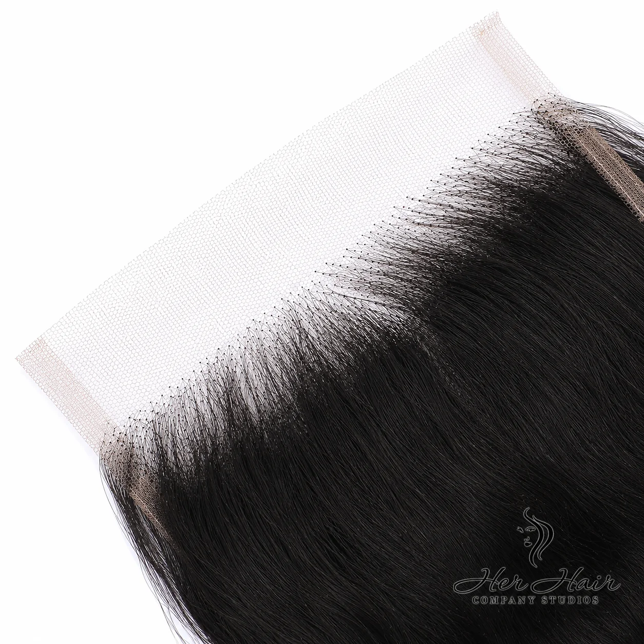 Close-up of Her Hair Company Brazilian Raw Wavy 5x5 HD lace closure showing detailed hairline and natural wave pattern.