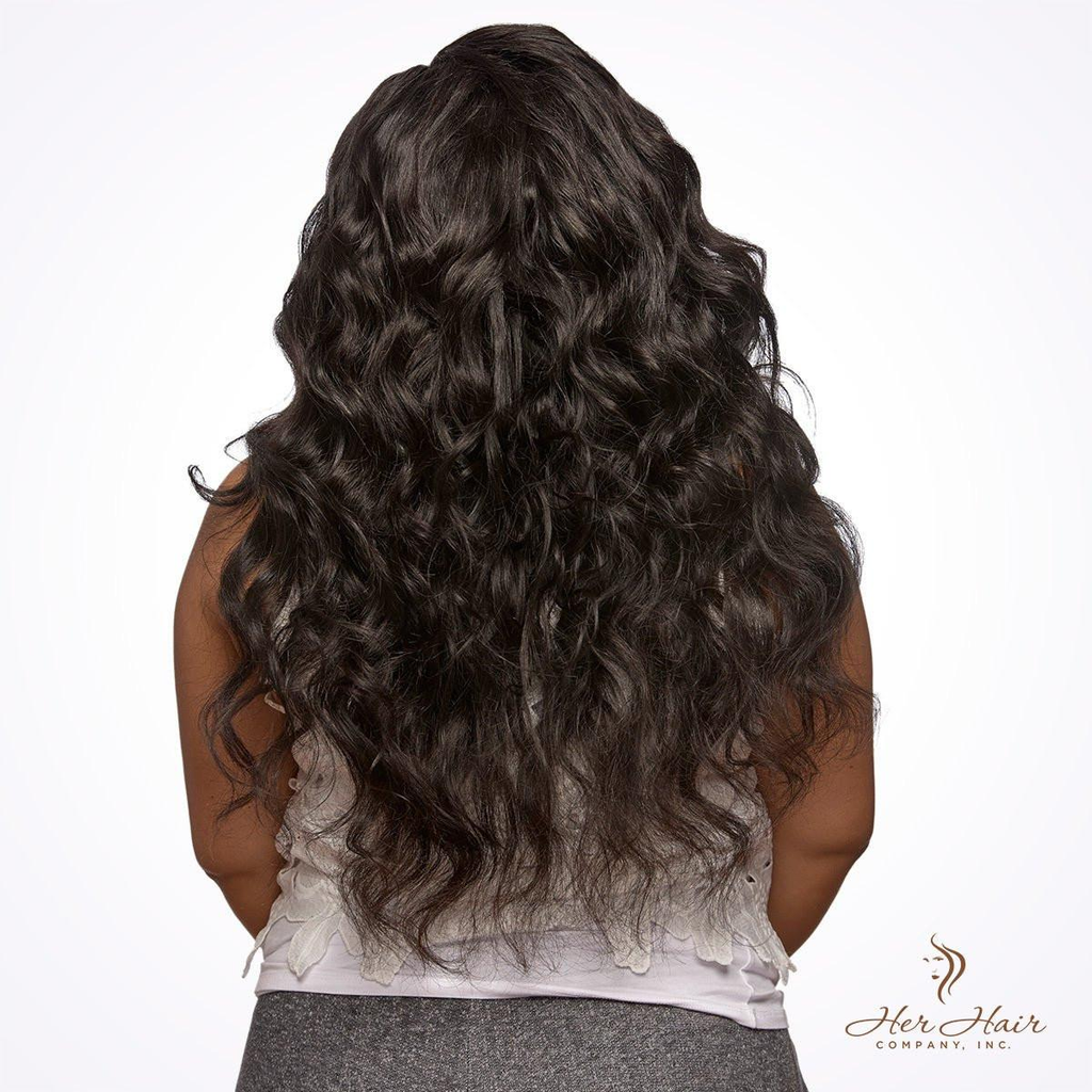 Brazilian wavy hair bundle from Her Hair Company, showing shiny, natural wavy hair with a white top background.