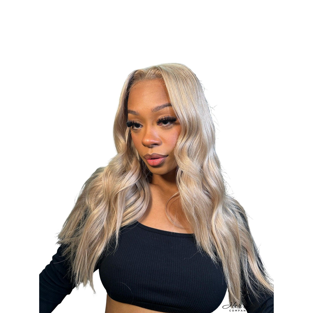 Three bundles of Brazilian 613 blonde body wave hair extensions from Vendor-Unknown, displayed in the image.