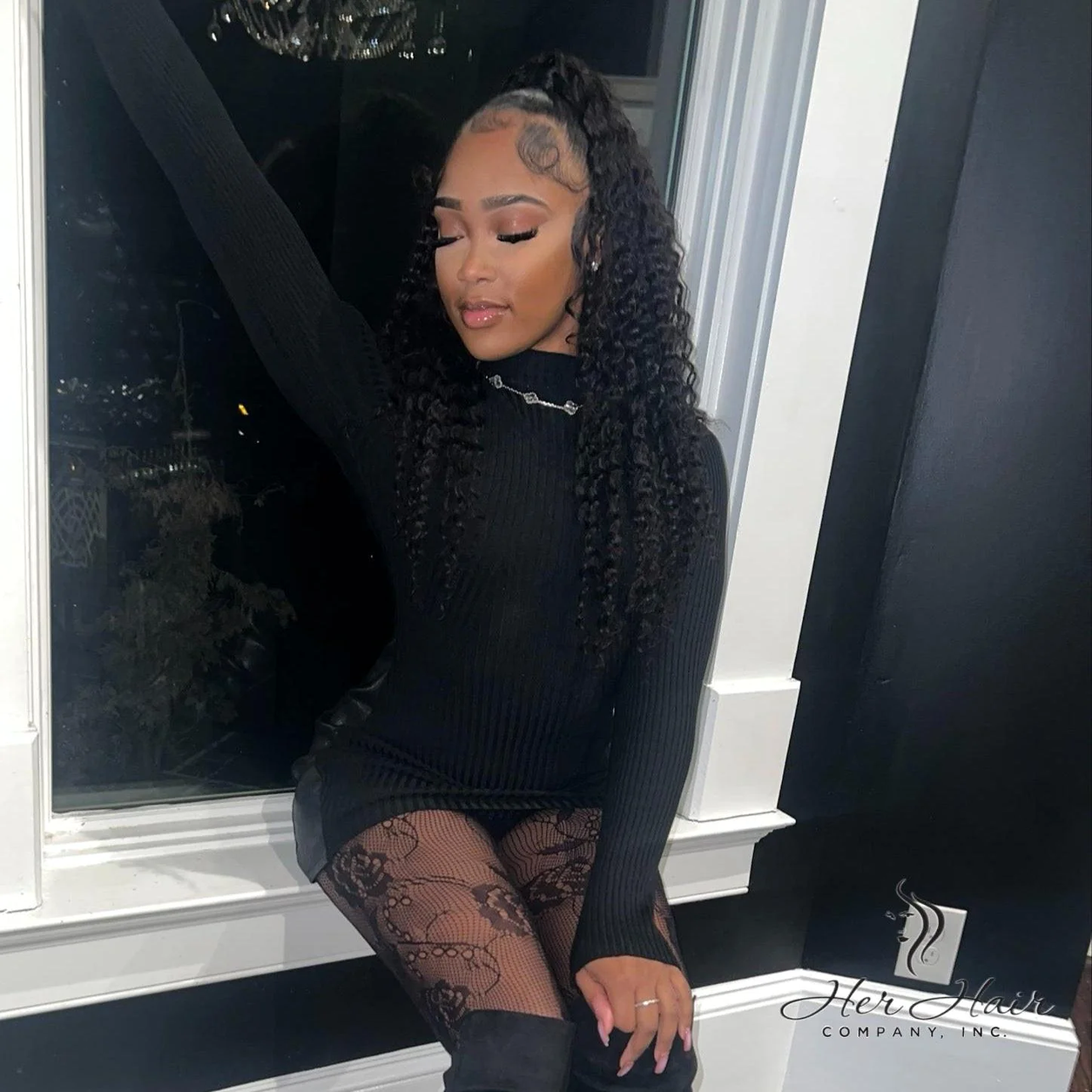 Brazilian Deep Wave Hair bundle from Her Hair Company, showing wavy, natural-texture hair for a full, lush hairstyle.