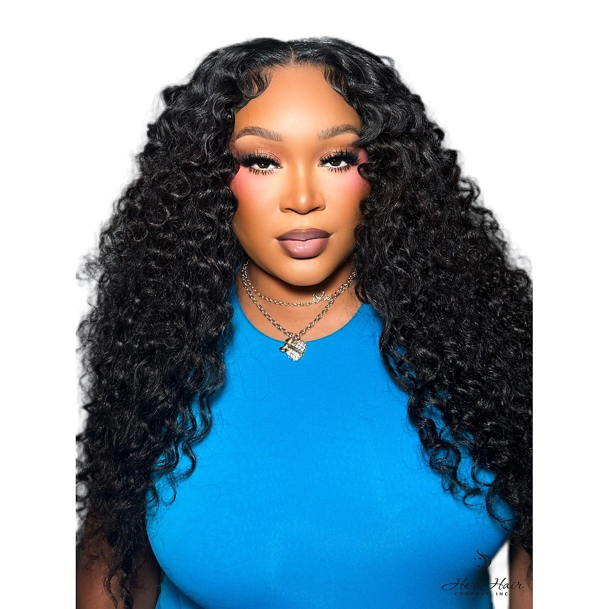 Front view of a model wearing a Burmese Raw Wavy Hair bundle from Her Hair Company, showcasing the natural wavy texture and full length.