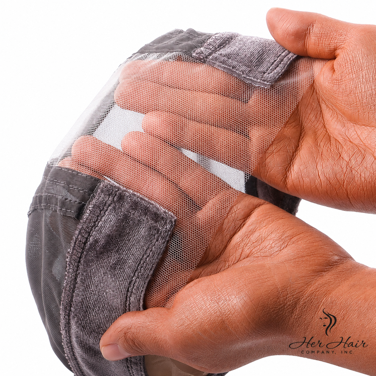 Her Hair Company wig grip cap with lace mesh detail, designed to secure wigs comfortably and securely.