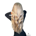 Three bundles of Brazilian 613 blonde hair extensions, displayed in a standard bundle deal on a hair installation background.