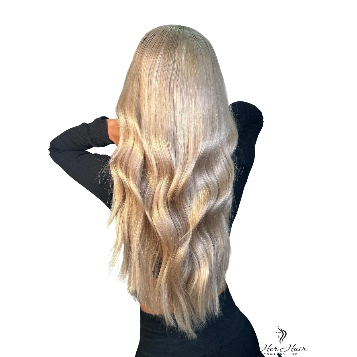 Three bundles of Brazilian 613 blonde hair extensions, displayed in a standard bundle deal on a hair installation background.
