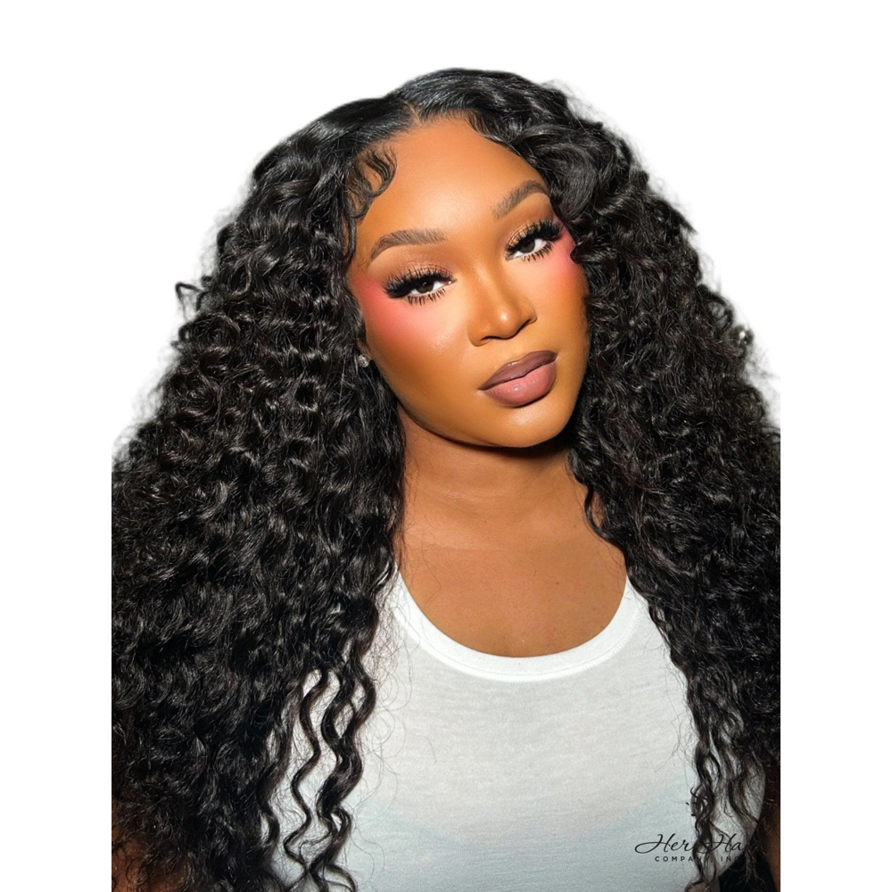 Burmese raw wavy hair bundles from Her Hair Company, showing four natural wavy hair bundles with a white top attachment.