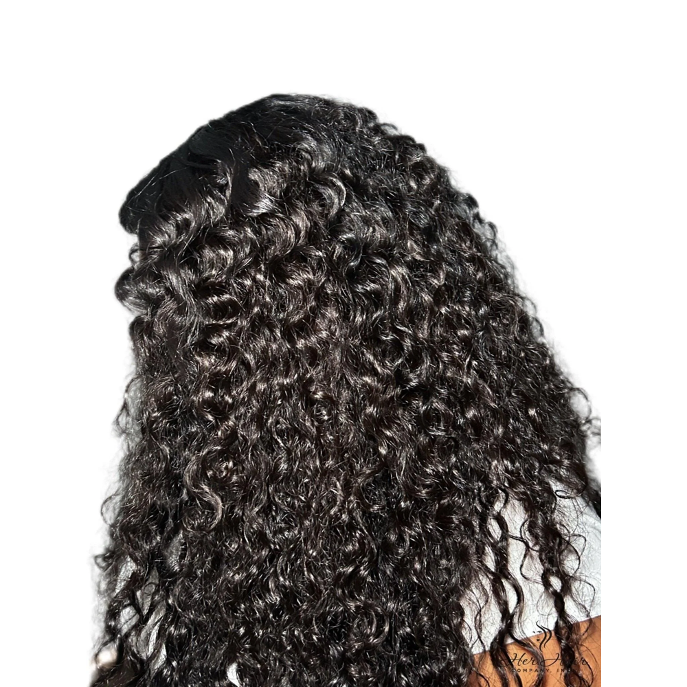 Burmese Raw Wavy Hair 4 Bundle Deal from Her Hair Company, showing side and back view of natural wavy hair bundles on a white background.