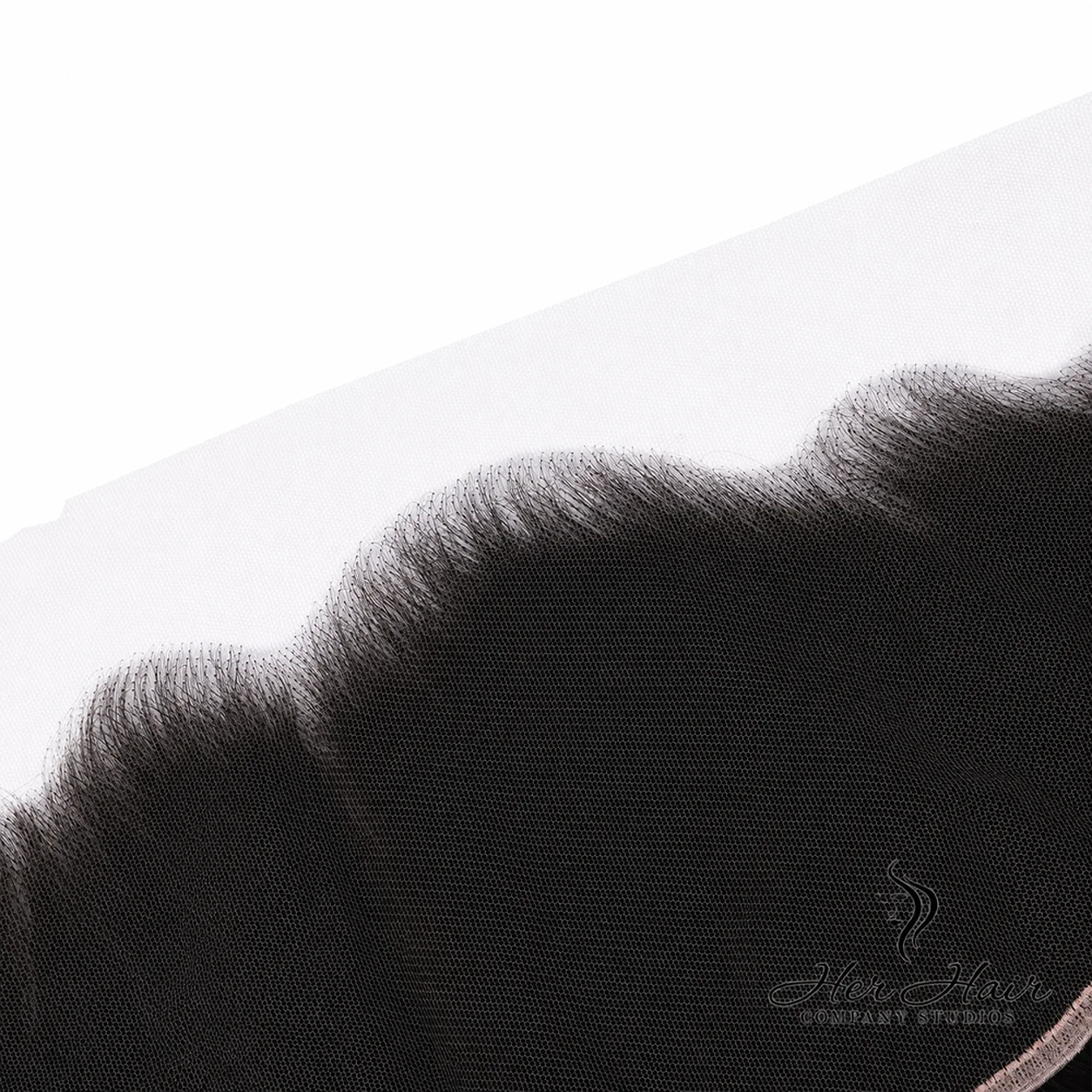 Close-up of Her Hair Company Brazilian Straight 13x6 HD lace frontal showing detailed lace mesh and hair strands.