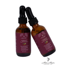 Two bottles of Honduran Batana Oil by Her Hair Company, showcasing the natural, authentic hair oil product with labels visible.