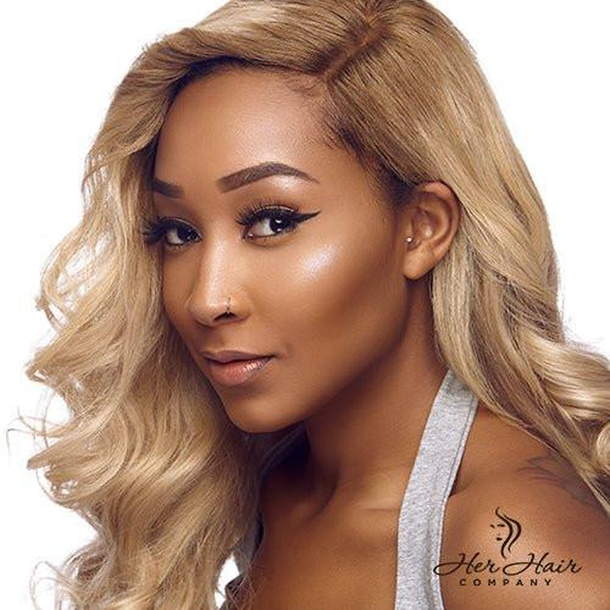Close-up of Eurasian 613# hair bundles, showing body wave texture, part of a 4-bundle deal for natural, stylish hair extensions.