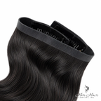 Brazilian clip-in hair extensions standard bundle with weft band, natural shiny premium human hair for added length and volume.