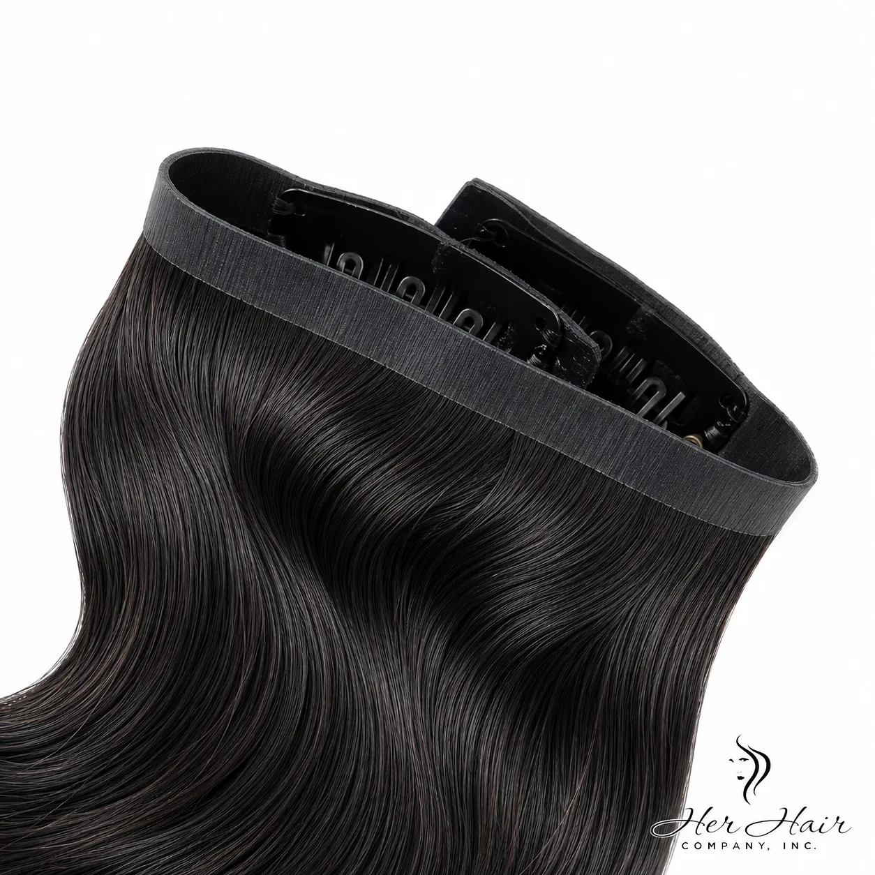 Brazilian clip-in hair extensions standard bundle with weft band, natural shiny premium human hair for added length and volume.