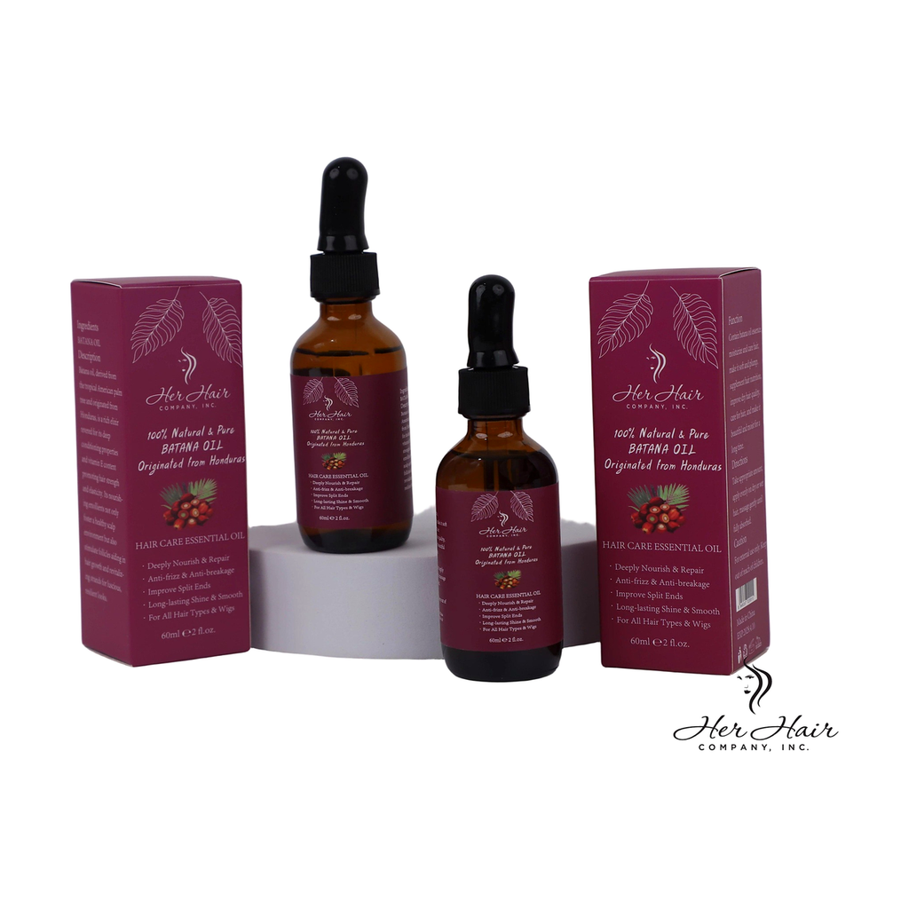 Two bottles of Honduran Batana Oil from Her Hair Company, showcasing the natural, authentic product in packaging.
