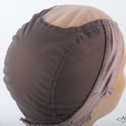 Her Hair Company wig grip cap showing snug fit and adjustable straps for secure and comfortable wig wear.