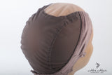 Her Hair Company wig grip cap showing snug fit and adjustable straps for secure and comfortable wig wear.