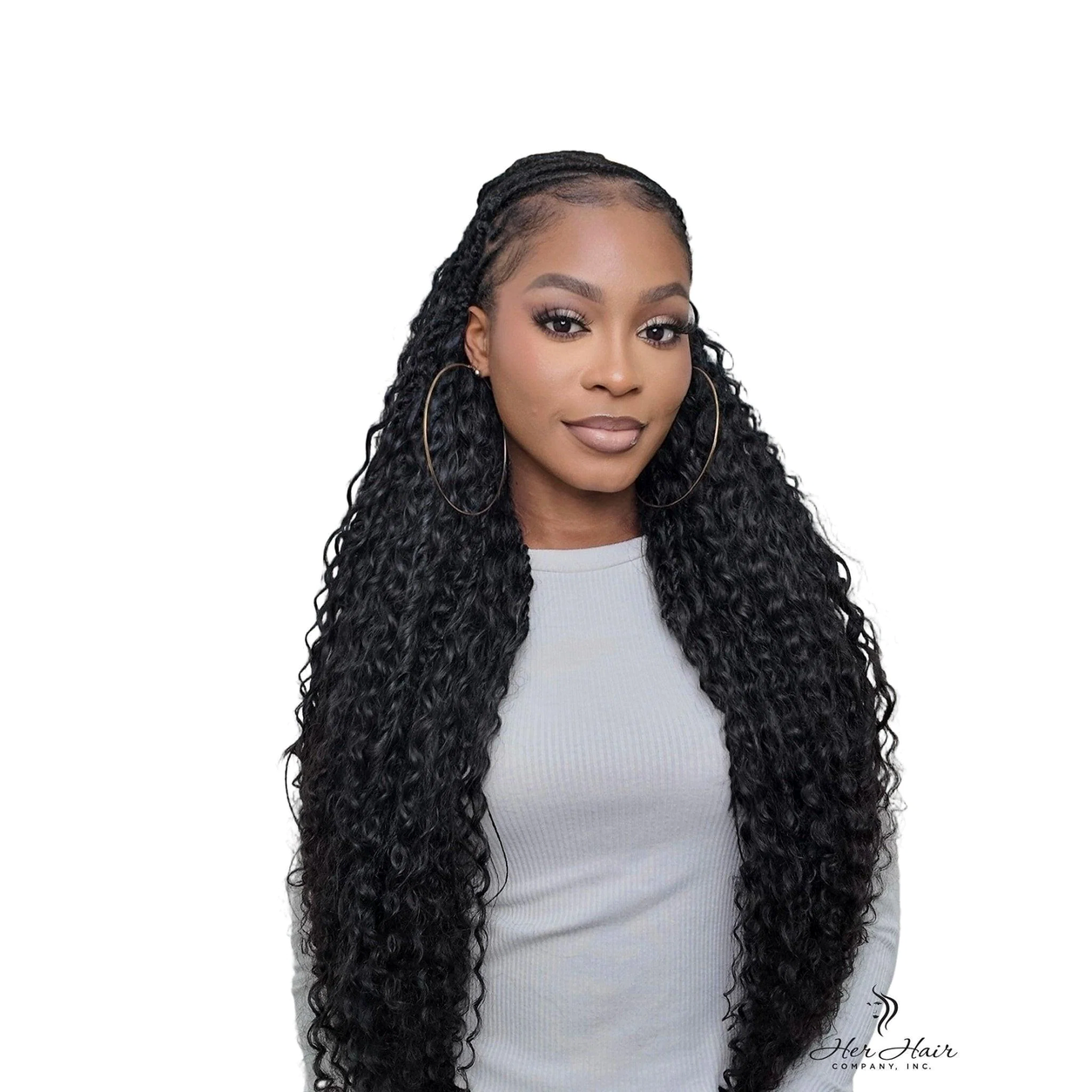 Deep curly bulk hair from Her Hair Company in a long braided style, showcasing the natural texture and front view.
