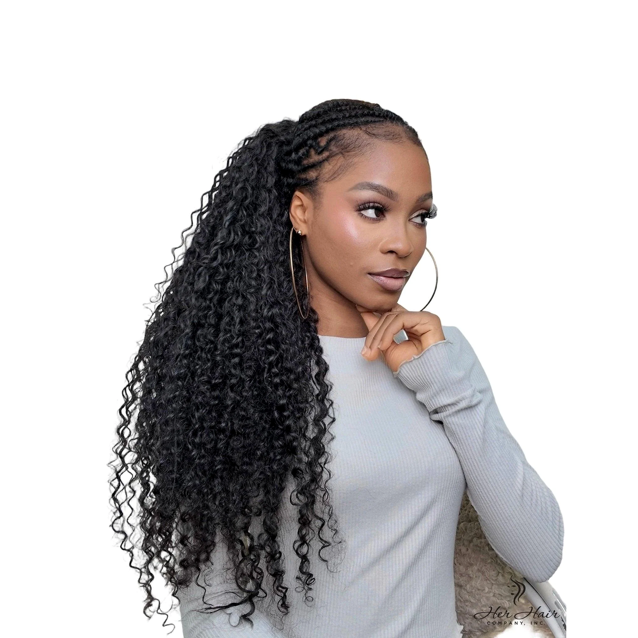 Deep curly bulk hair in a standard bundle from Her Hair Company, styled in a long braided side look.