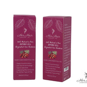 Honduran Batana Oil from Her Hair Company in a clear glass bottle, showcasing the rich, natural hair care product.