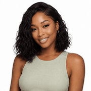 Brazilian wavy hair bundles from Her Hair Company, showing four standard hair wefts with natural wavy texture.