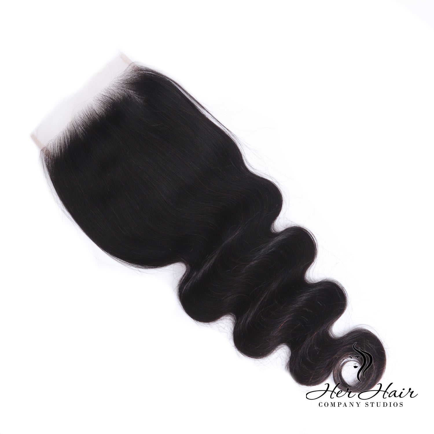 Brazilian Body Wave 4x4 HD lace closure from Her Hair Company, showing close-up of the natural-looking lace and wavy hair texture.