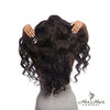 Brazilian Body Wave 5x5 HD lace closure from Her Hair Company, showing the natural wave pattern and lace front detail.