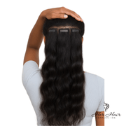 Her Hair Company Brazilian Tape-In hair extensions, straight style, shown in natural black color.