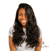 Straight Brazilian Tape-In extensions from Her Hair Company showing sleek, natural-looking hair in a close-up view.