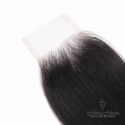 Brazilian Body Wave 2x6 HD lace closure by Her Hair Company, featuring natural waves and transparent lace for seamless blending.