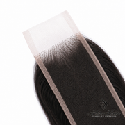Brazilian Body Wave 2x6 HD lace closure by Her Hair Company, showcasing natural wave pattern and transparent lace material.