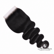 Brazilian Body Wave 6x6 HD lace closure by Her Hair Company, showing close-up of wavy hair with lace closure detail