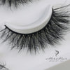 Her Hair Company false eyelashes, close-up view showing full, natural-looking eyelash strips for enhanced eye beauty.