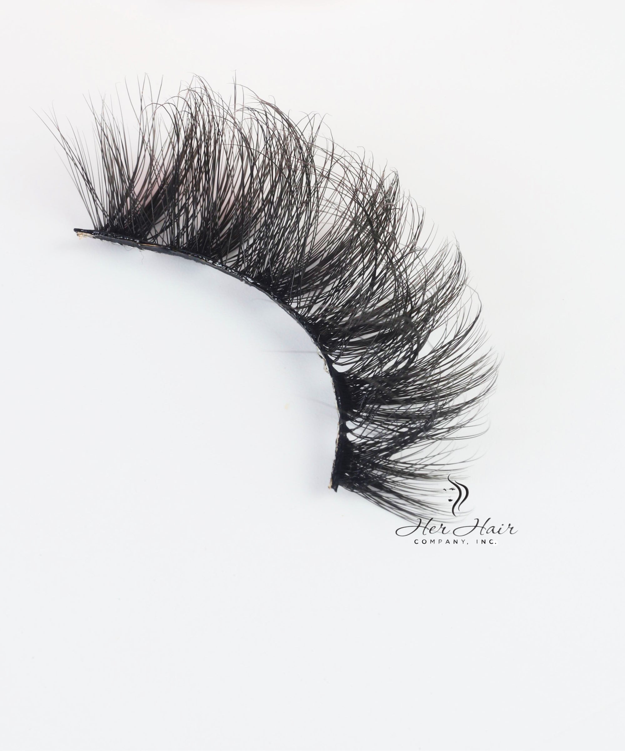 Her Hair Company false eyelashes with natural-looking lash extensions, displayed on a clean white background.