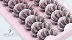 Her Hair Company false eyelashes with natural-looking lash extensions, shown in close-up on a white background.