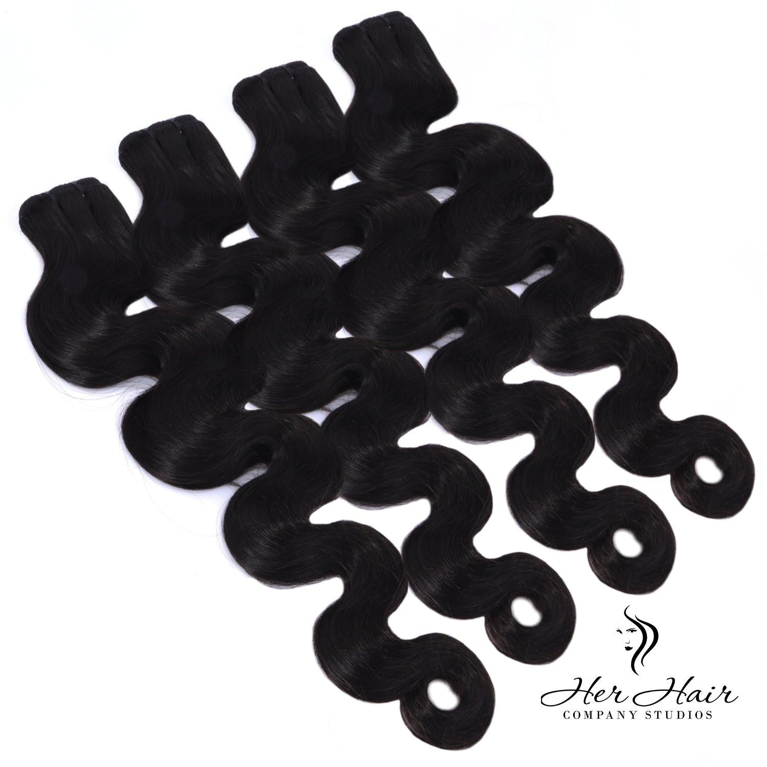 Burmese raw body wave hair bundles from Her Hair Company, four-pack standard bundle deal showing natural wavy hair extensions.